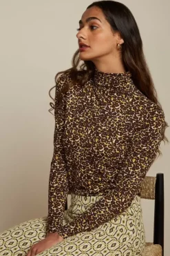 Betsy Rollneck Top Hustle