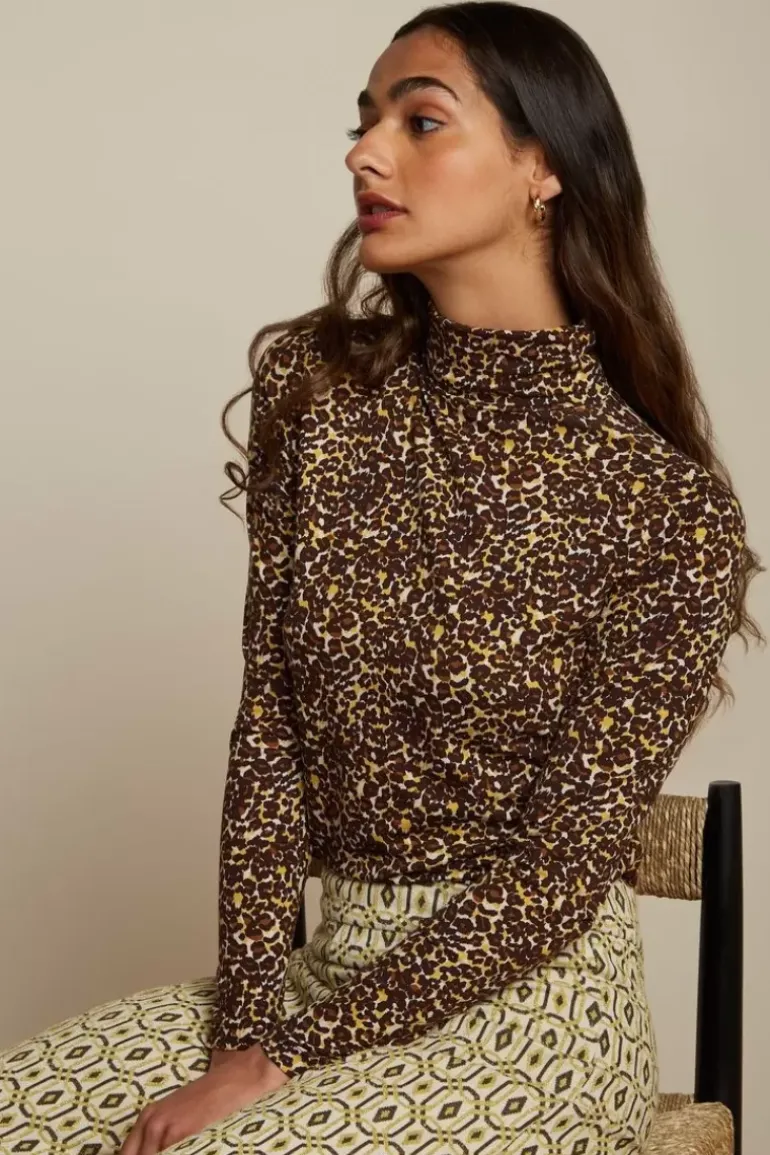 Betsy Rollneck Top Hustle