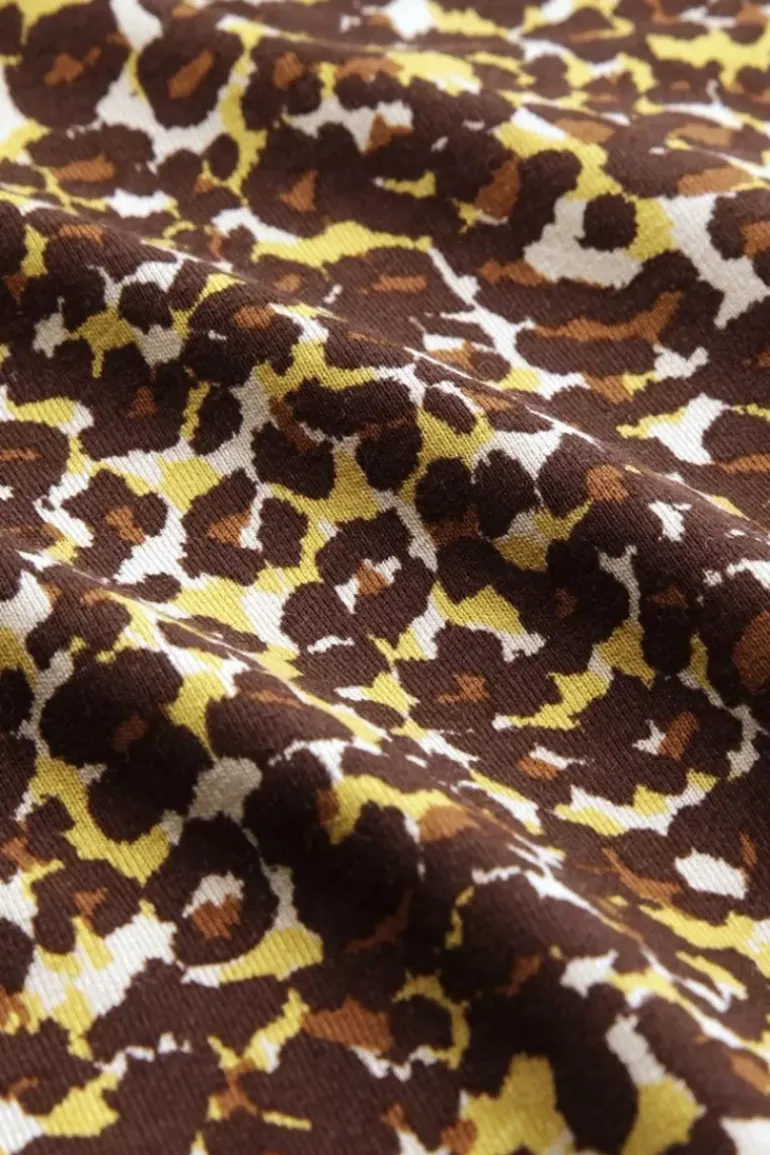 Betsy Rollneck Top Hustle